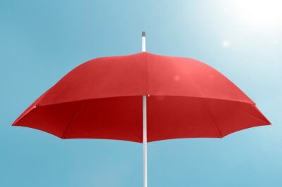 red umbrella with copy space blue sky 53876 102004