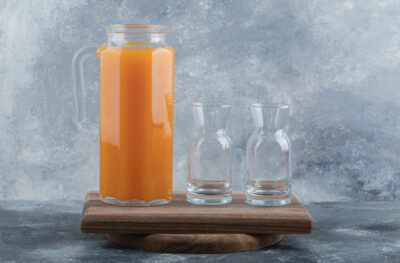 fresh juice empty glasses wooden board scaled