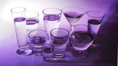 liquid different type glasses purple background scaled
