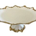 Karina round footted platter