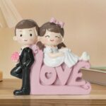 Tied Ribbons Romantic Love Couple Statue – Resin Showpiece (Multicolor)
